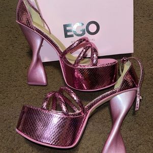 Brand New, never worn, metallic Pink ankle strap sculpted heels.